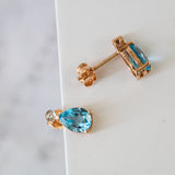 14K Rose Gold Round Diamond and Pear Cut Blue Topaz Earring