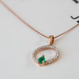 14K Rose Gold Pear Cut Emerald and Round Diamond Open Circle Necklace