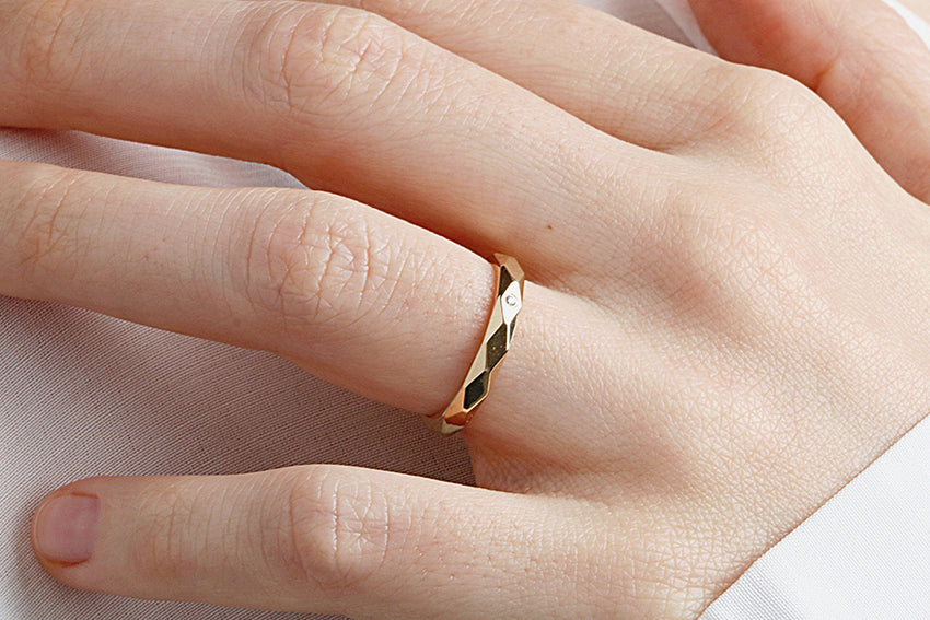 14K Gold 3mm Multi Faceted Wedding Band A Single Diamond